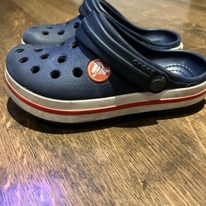 Little boy size 8 Red and white blue crocs